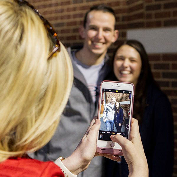 person taking a photo with a phone