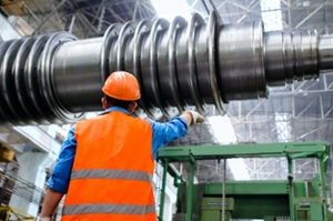 man wearing orange hat while at work