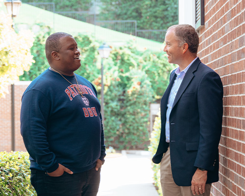 student talking with an advisor