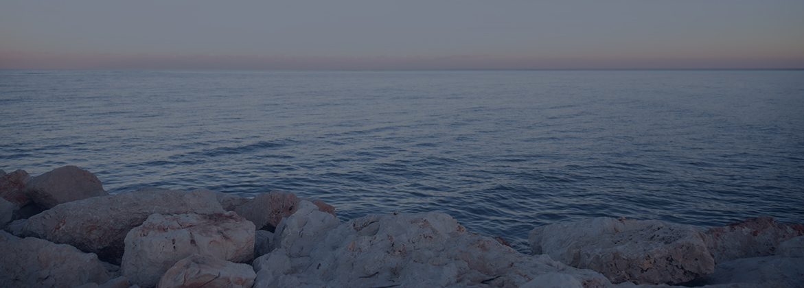 picture of a body of water with rocks 