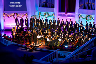 Choral group singing on a stage