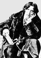 black and white image of Oscar Wilde sitting