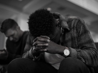 Students praying in chapel