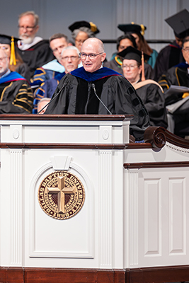 Dr. Hance Dilbeck speaking at DBU for commencement